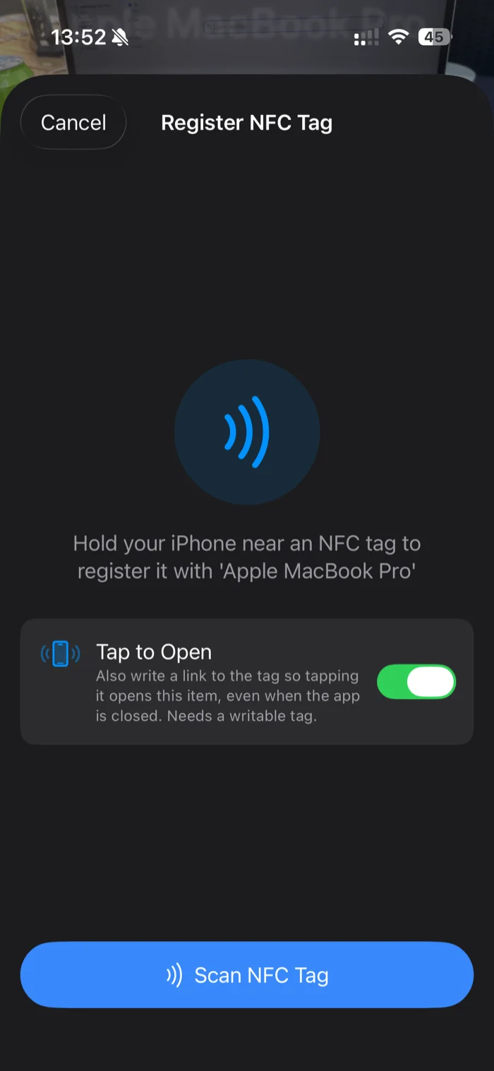 The Register NFC Tag sheet in additem.to prompting the user to hold the iPhone near a tag, with a Tap to Open toggle and a Scan NFC Tag button